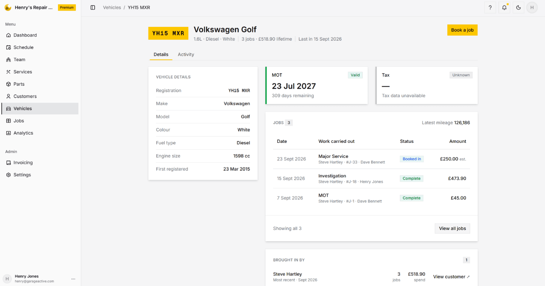 A vehicle page, showing the details held against the plate, the MOT expiry and every job the garage has carried out on it.